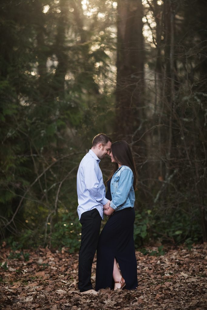 couple embracing during Lincoln Park maternity photo session