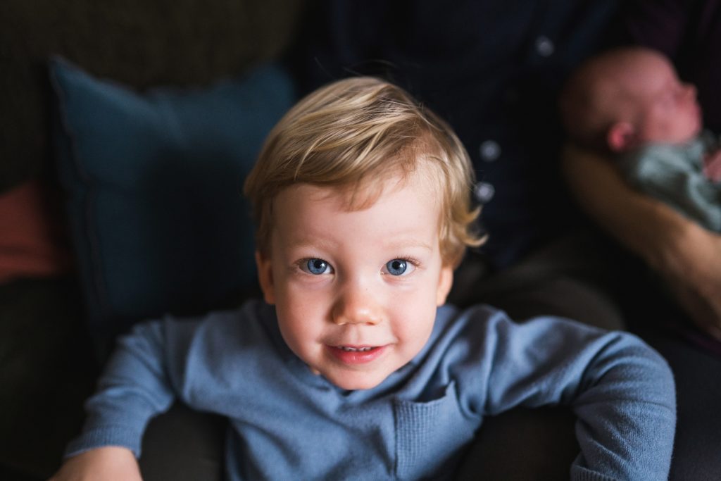 Toddler boy in blue for baby photography session in Seattle