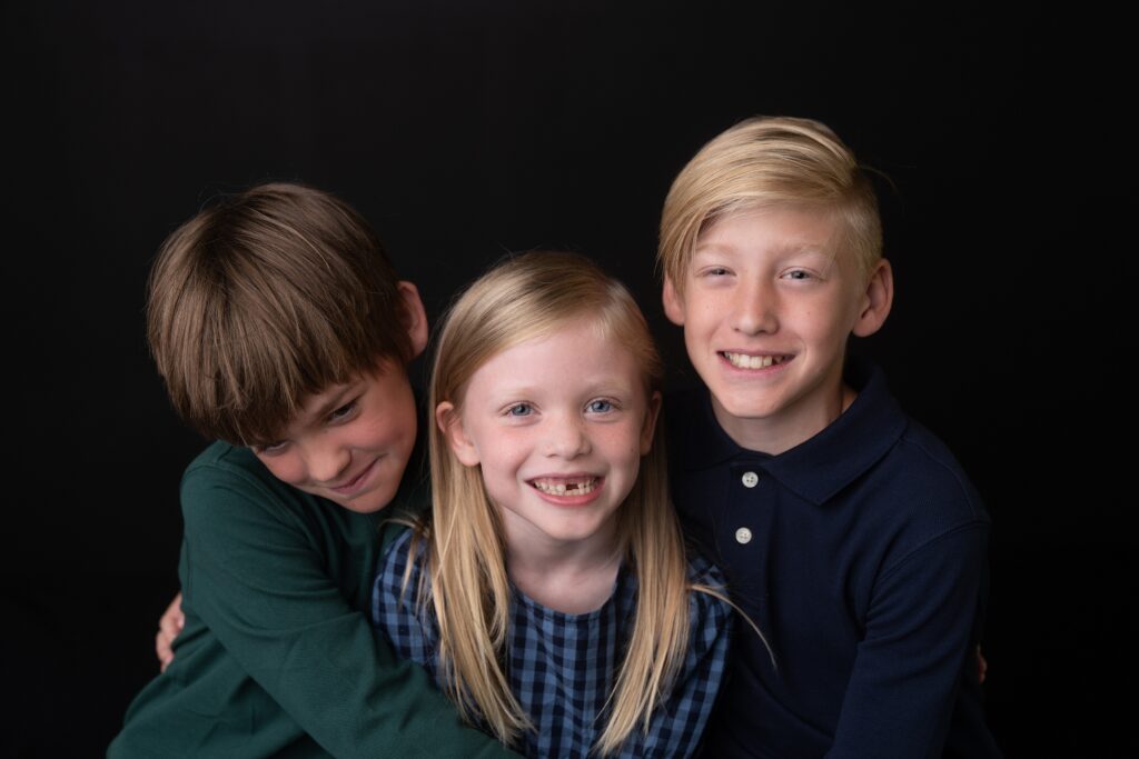 Fine Art School Portrait that shows three siblings together