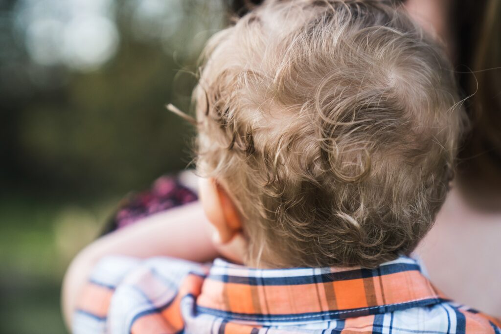 One year old boy's curls during family photos in North Bend, WA