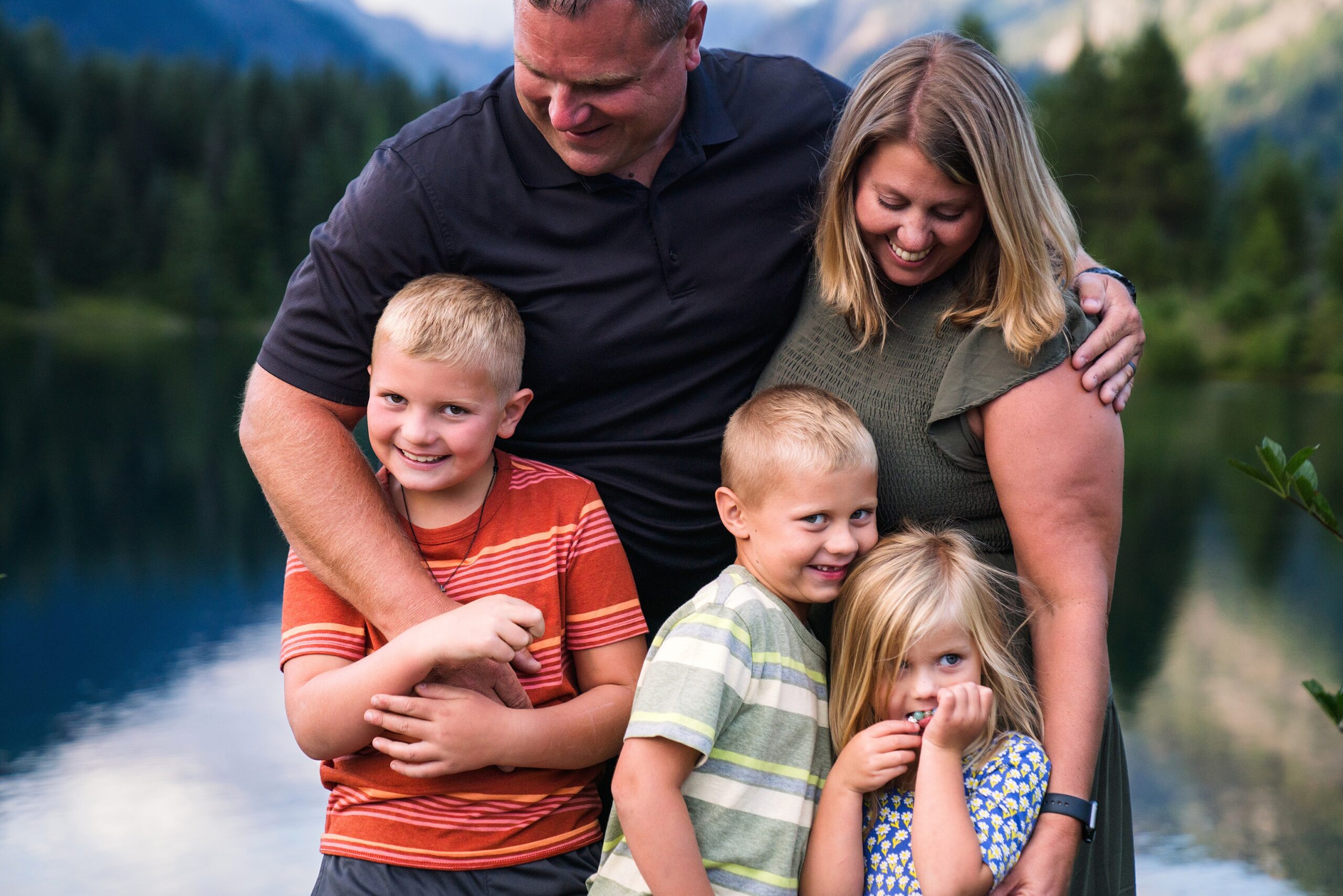Family portrait by the water at Gold Creek Pond on Snoqualmie Pass, not during fall but summer