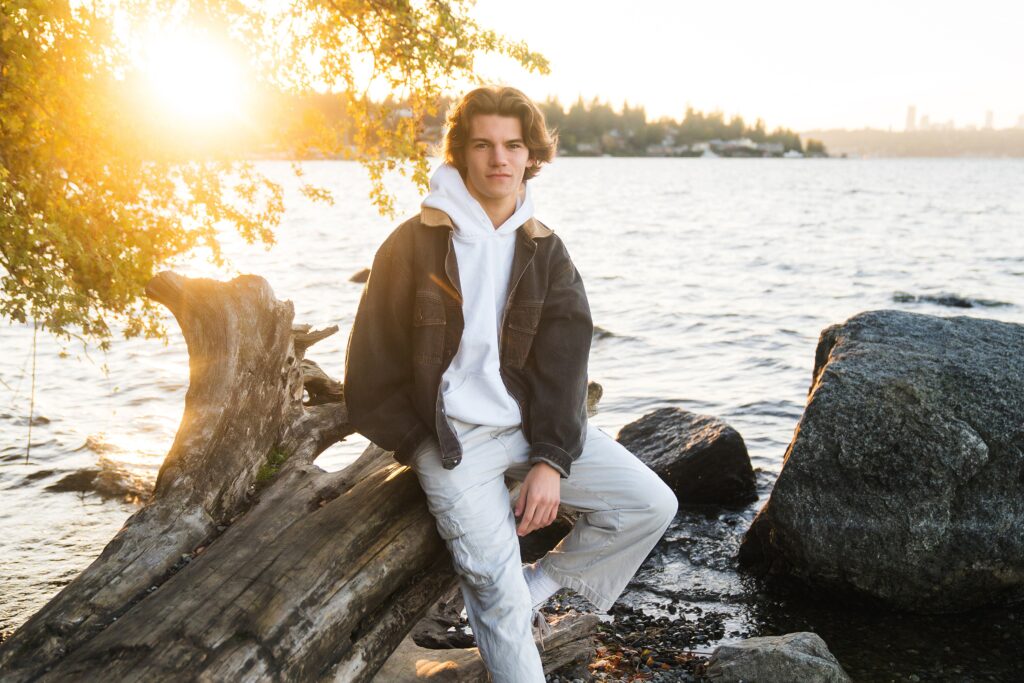 backlight senior photo by the water on Mercer Island