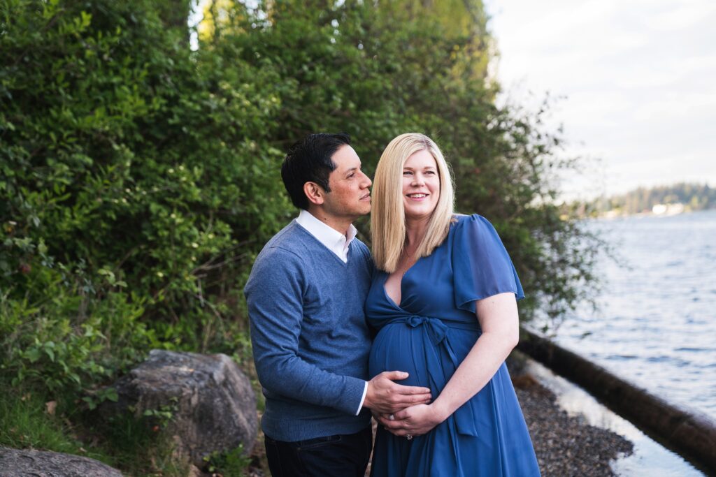 Couple by the water during Seattle maternity portrait session