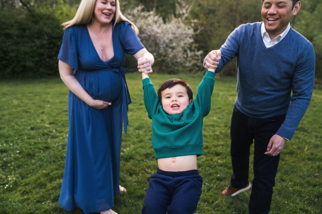 Playful maternity portrait at Luther Burbank Park, Mercer Island, Wa