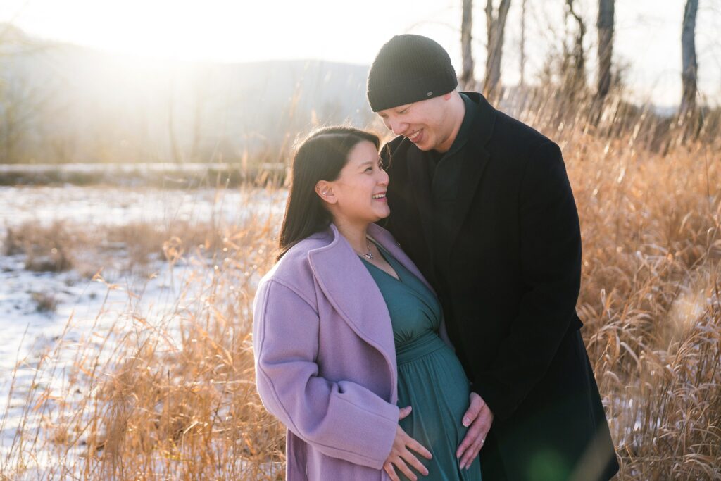 Winter sunset photo session in the Seattle area of couple snuggled together