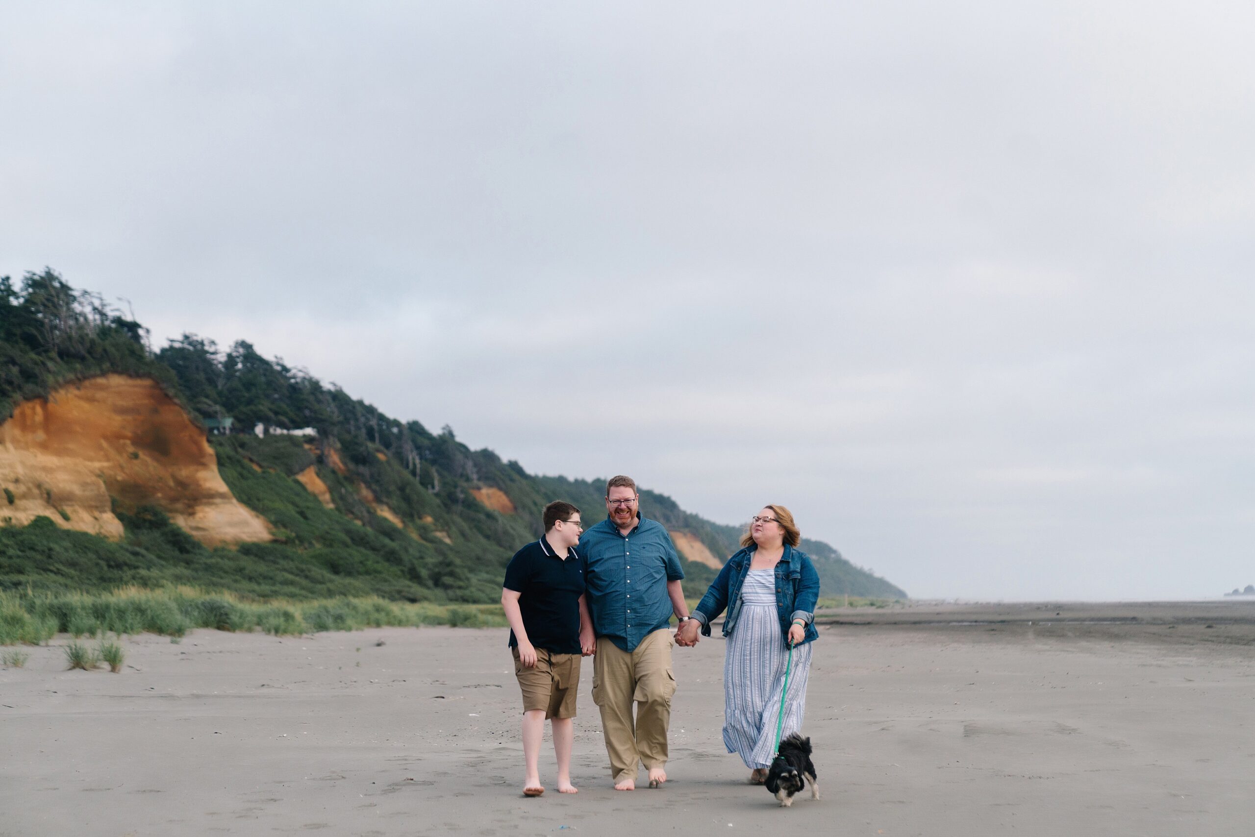 Family photography session as example of what to do in Seabrook, family walking down the beach