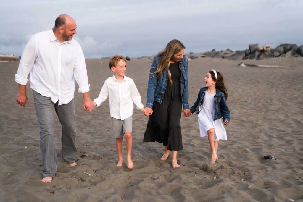 Family walking on the beach in Ocean Shores, Wa during family photoshoot