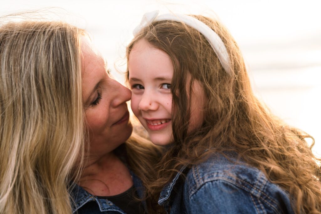 Mother and daugther during beach family photo at Seabrook, Wa