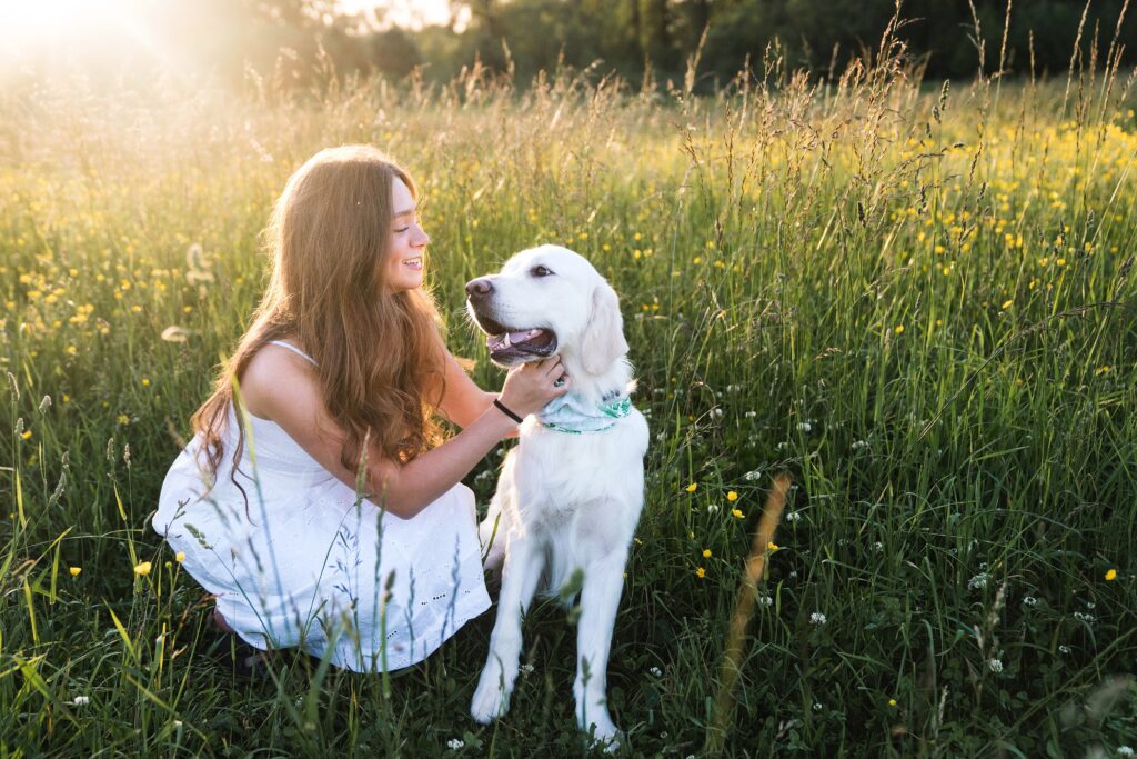 Senior girl and her dog for photos in field near Mount Si