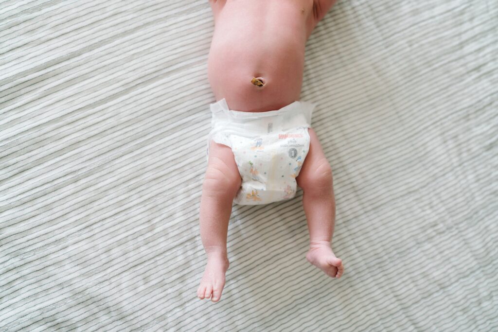 Newborn baby feet and tummy